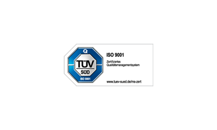 Eine TÜV SÜD ISO 9001 Zertifizierungsplakette für Qualitätsmanagementsysteme.