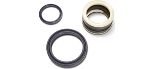 Drei verschiedene hydraulische Dichtungsringe in Schwarz und Weiß auf weißem Hintergrund.