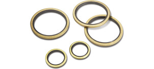 Fünf unterschiedlich große Usit-Ringe aus Metall mit innerer Gummidichtung.