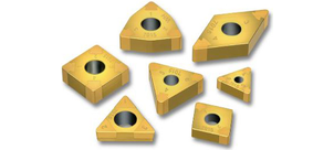 Eine Auswahl verschiedener CBN Wendeschneidplatten in unterschiedlichen geometrischen Formen.