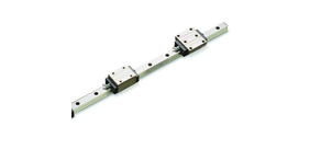 Eine lineare Profilschienenführung mit zwei Schlitten auf einer Metallspur.